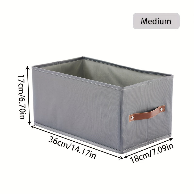 Qo‘lqopli to‘g‘ri burchakli saqlash qutilari, shkaflar yoki yotoq javonlari uchun mukammal. Ushbu yig‘iladigan mato qutilar kulrang yoki bej rangda bo‘lib, joyingizni tartibga solishda ideal. Yotoq osti saqlash uchun ham juda yaxshi!