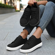Zapatillas de skate casual ligeras para mujer en negro y blanco