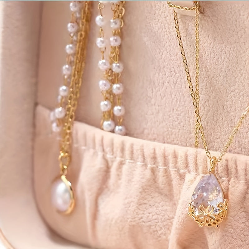 Organizador de joyas de viaje color macaroon, estuche compacto para pendientes, collares y anillos