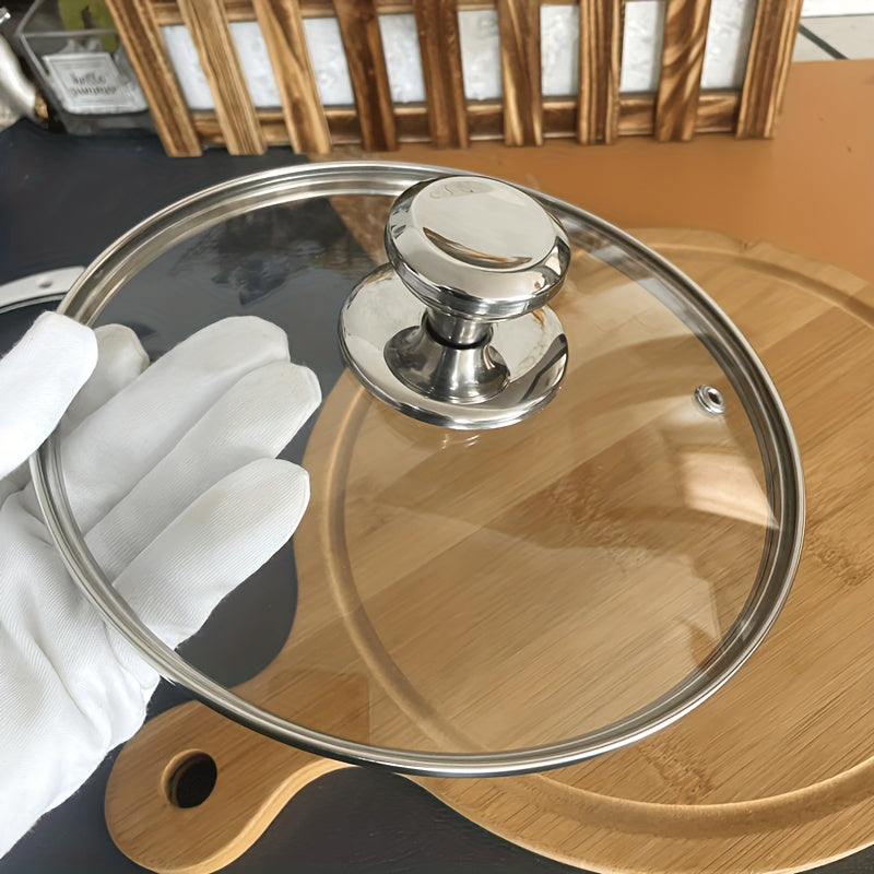 Круглая универсальная крышка из закаленного стекла - идеально подходит для воков, пароварок и суповых кастрюль. Легко чистится и толстая для многоцелевого использования - необходимый аксессуар для кухонной посуды.