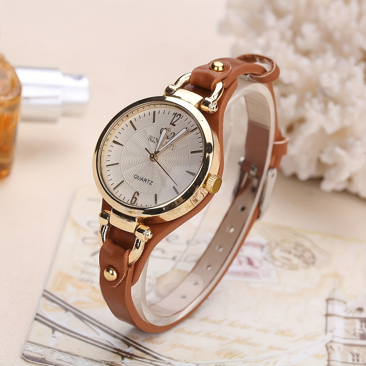 Women's Quartz Watch with Black Faux Leather Strap and Gold Accents Elegant Analog Wristwatch