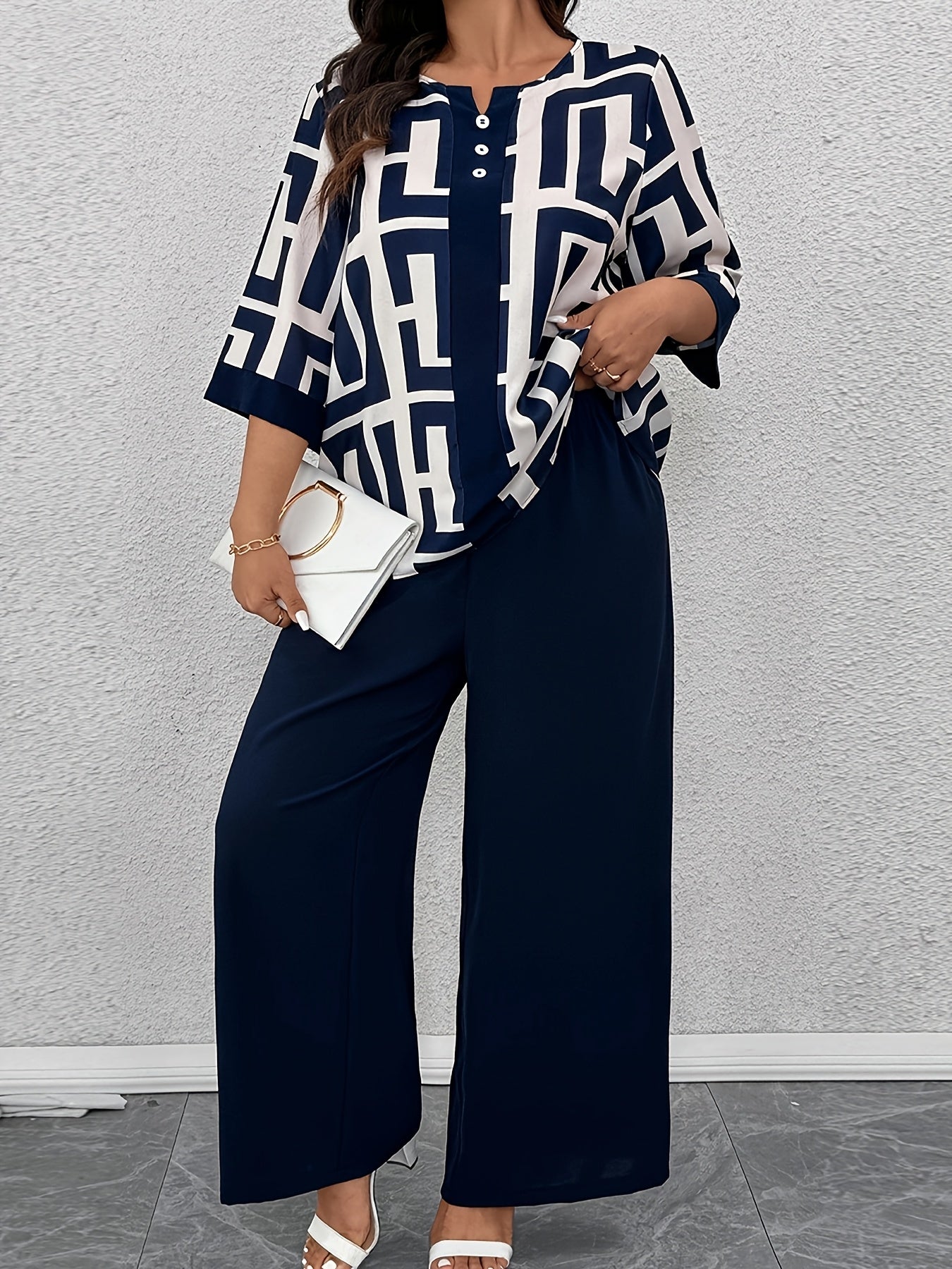 Conjunto de dos piezas para mujer con estampado geométrico, top de escote en V y pantalones de pierna ancha, poliéster