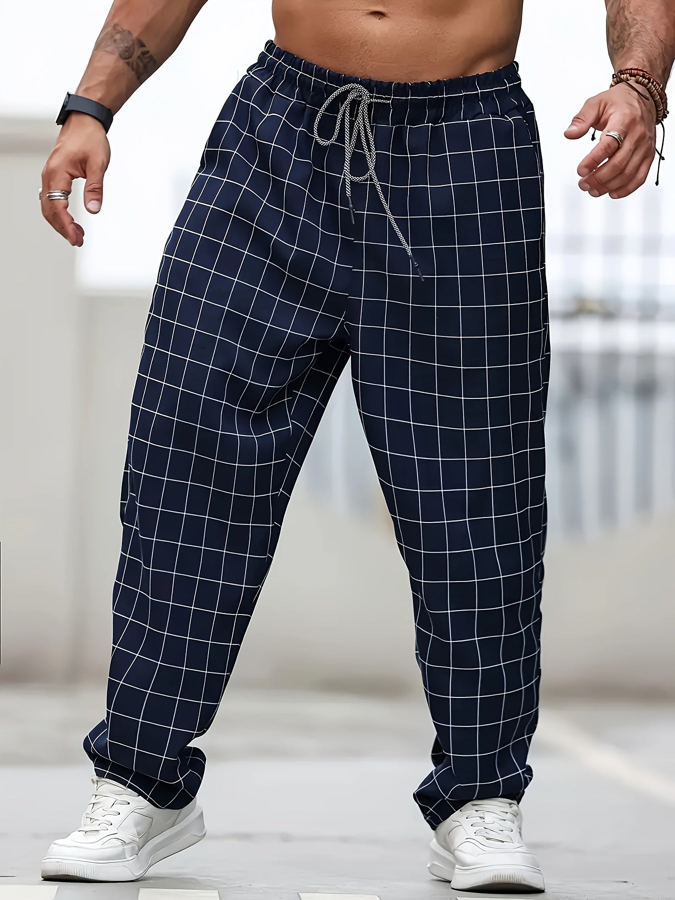 Pantalones jogger casual de cuadros de poliéster tejido de tamaño grande para hombre con cintura ajustable