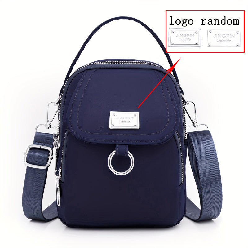 Ayollar uchun nylon crossbody sumka, katta sig'imli, bir rangli, zip yopilishi, polyester astarli, kundalik foydalanish va maxsus tadbirlar uchun ko'p funksiyali, qizil yoki qora ranglarda mavjud.