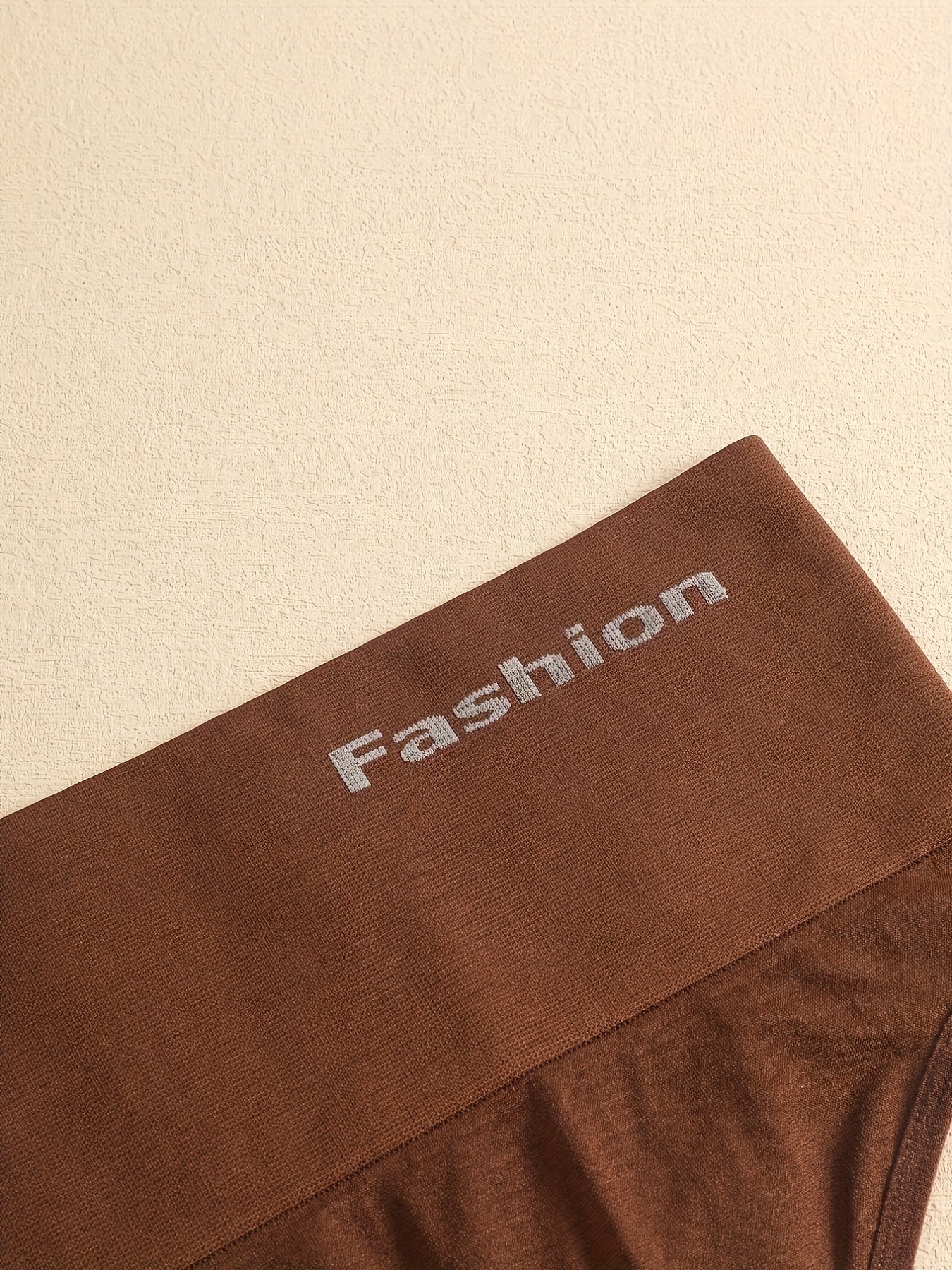 Три многоцветные бесшовные фитнес-брюки с высокой талией для женщин.