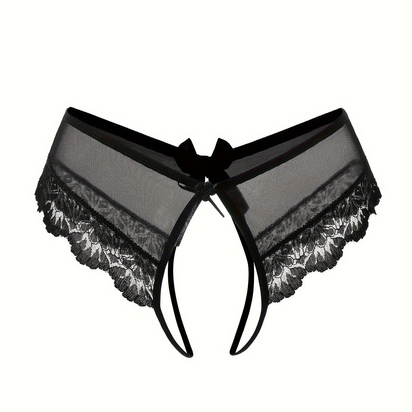 Shaffof dantel thong ichki kiyim, ochiq qorinli, past bel dizayni. 90% poliamid va 10% elastan to'qimachilik matosidan tayyorlangan, og'irligi 111 gsm.