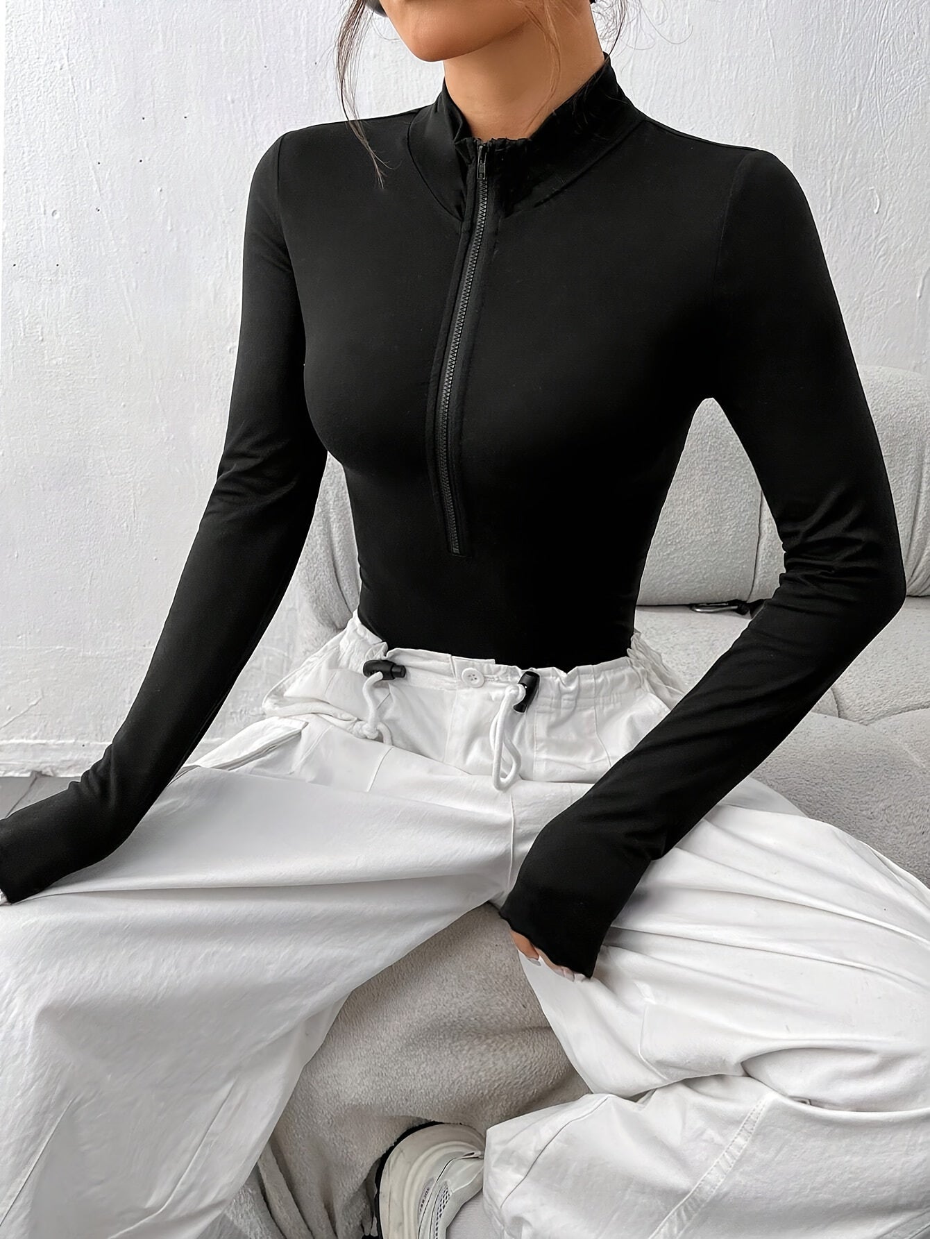 Women's Black Y2K Style Zip-Up Bodysuit with Long Sleeves and Stretchy Fabric