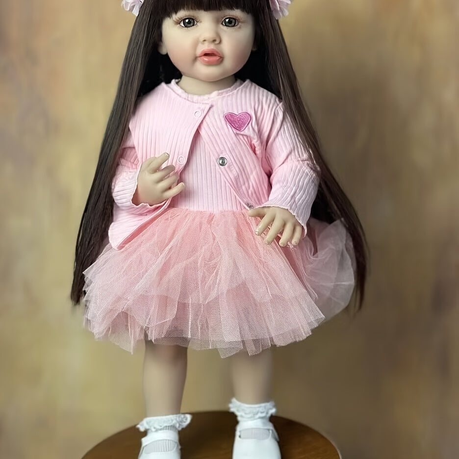 22-Inch Pink Reborn Baby Doll with Long Hair Wig Fully Poseable for Play and Collectors