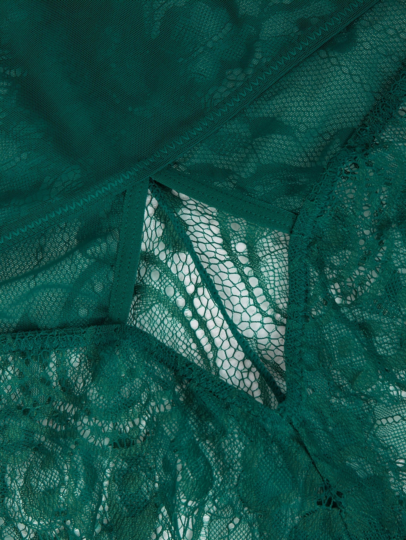 Body de encaje verde para mujer con patrón floral, cuello alto, manga larga, escote en forma de ojal y lencería en la espalda