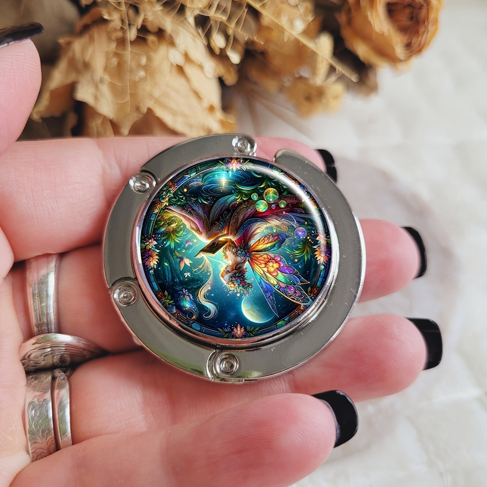 Colgador de bolso plegable portátil con tema de cuento de hadas, gancho de metal para bolso de mano para mesas