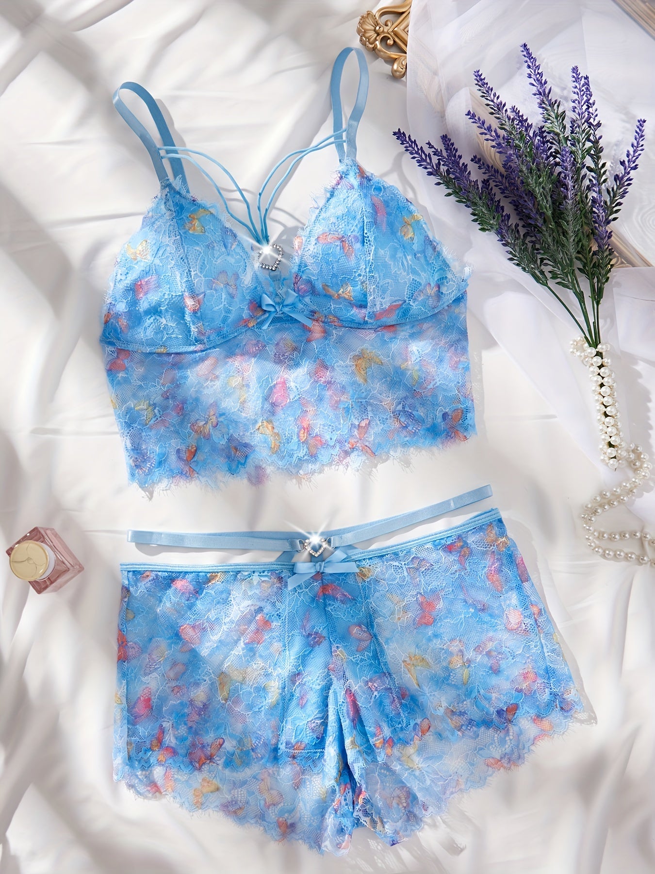 Conjunto de lencería de encaje colorido con lazo y decoración de corazón, camisola y pantalones cortos para mujer