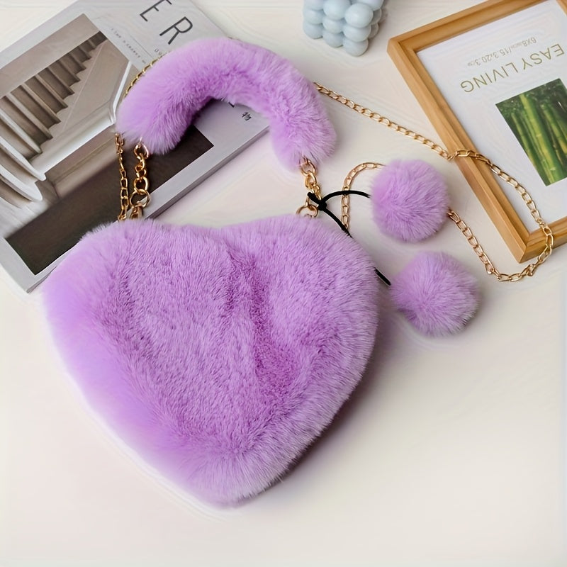 Yengil dizayndagi ajinli ayollar uchun plush yurak shaklidagi yelka sumkasi, ajratiladigan tasma va zip yopilishi bilan. Kundalik sayrlar, xaridlar va uchrashuvlar uchun mukammal. Yorqin pushti va boshqa ranglarda mavjud.