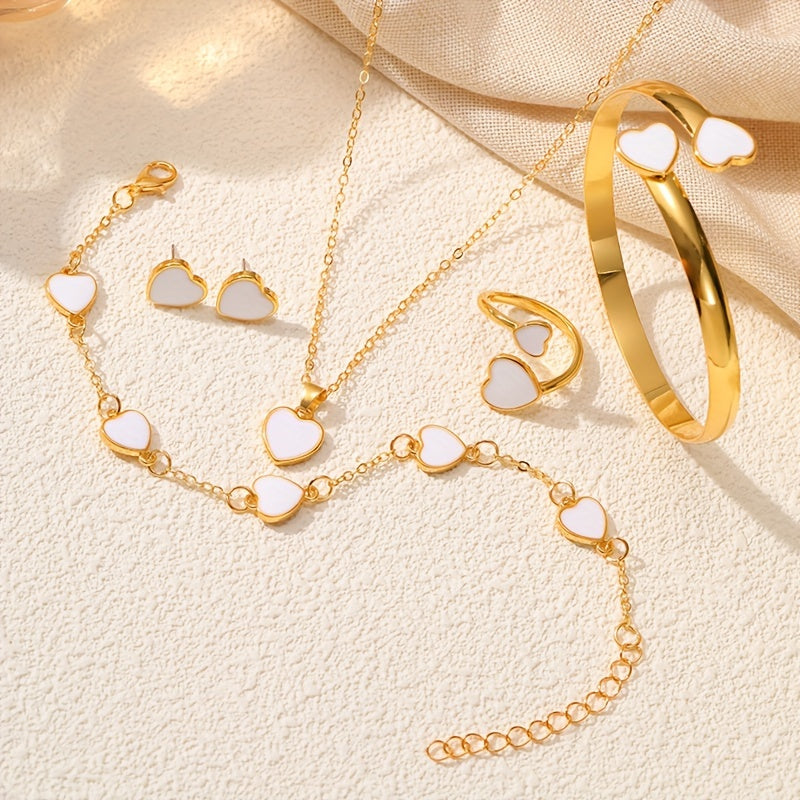 Ayollar uchun Sparkling Lucky Heart Jewelry Set 5 ta qismdan iborat: Bilaguzuk, Zanjir, Yurak marjon, Halqa va Quloq uzuklari. Oddiy dizayn, eng yaxshi do'stlaringiz yoki o'zingiz uchun o'z his-tuyg'ularingizni ifoda etish uchun mukammal sovg'a.