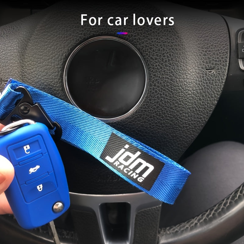 Issiq avtomobil kaliti zanjiri naylon tarmoq bilan ko‘k lentalik emblema kaliti bilan po‘lat klip bilan