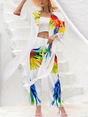 "Parrot Print Vacay 2 qismli ayollar uchun suzish kiyimlari, uzun yengli kimono va keng kesimli qoplama shimni o'z ichiga oladi."