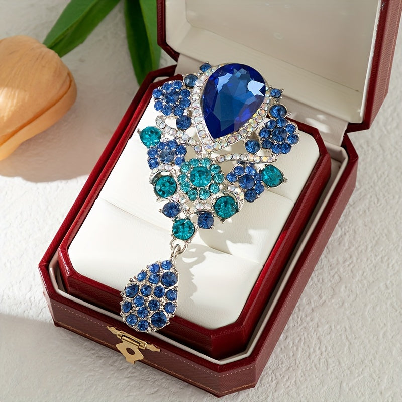 Zargarlik toshlari bilan bezatilgan nozik brosh - har qanday kiyimga zamonaviy va nafis qo'shimcha