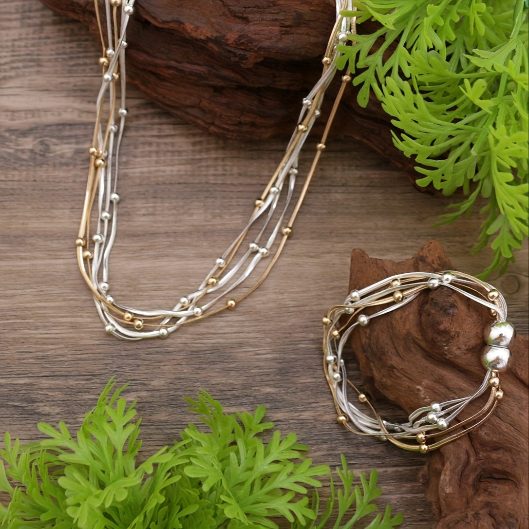 KAMILLE Vintage Punk uslubidagi misdan yasalgan qatlamli ilon zanjirli bilaguzuk va marjon to'plami, magnit qopqoq bilan, partiya va kundalik kiyim uchun uniseks zargarlik, Mardi Gras kuni aksessuar. Nikelga chidamli quloq to'pi va sovg'a uchun tayyor.