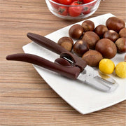 Stainless Steel Nutcracker with Ergonomic Grip and Food Processing Accessory