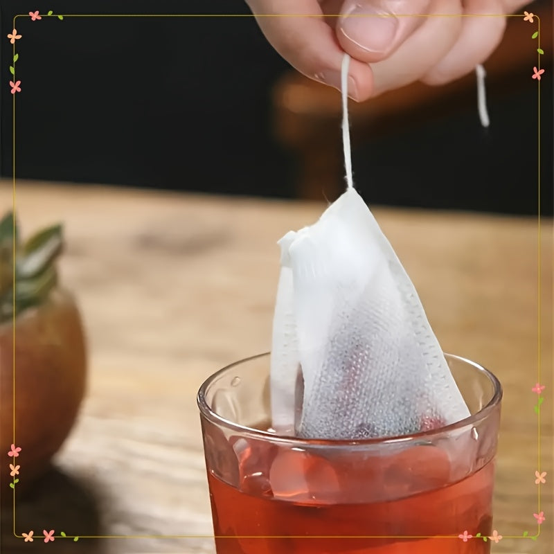 100 ta qayta ishlatiladigan to'qilmagan choy paketlari to'plami - oziq-ovqat darajasidagi materialdan tayyorlangan, nafas oladigan va choy, o'tlar va ziravorlar uchun ko'p maqsadli - uyda yoki sayohatda saqlash uchun ideal