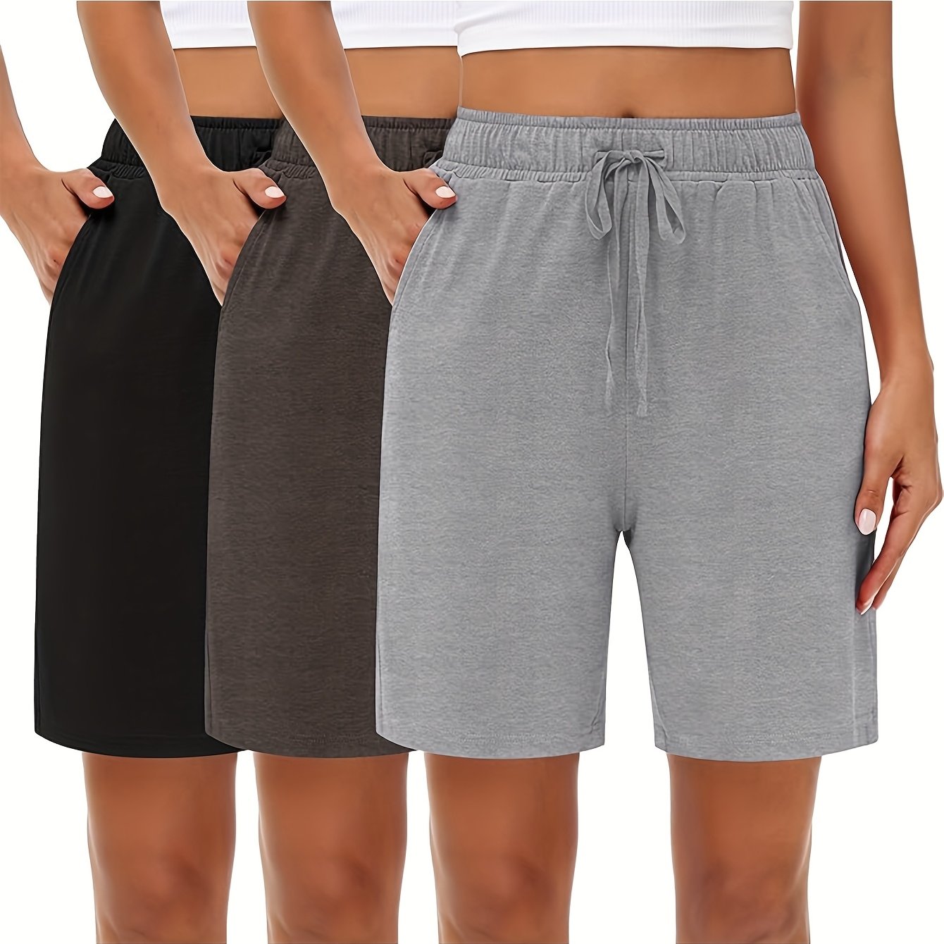 Plus Size Women's Moisture-Wicking Knee-Length Shorts with Pockets for Jogging and Casual Wear