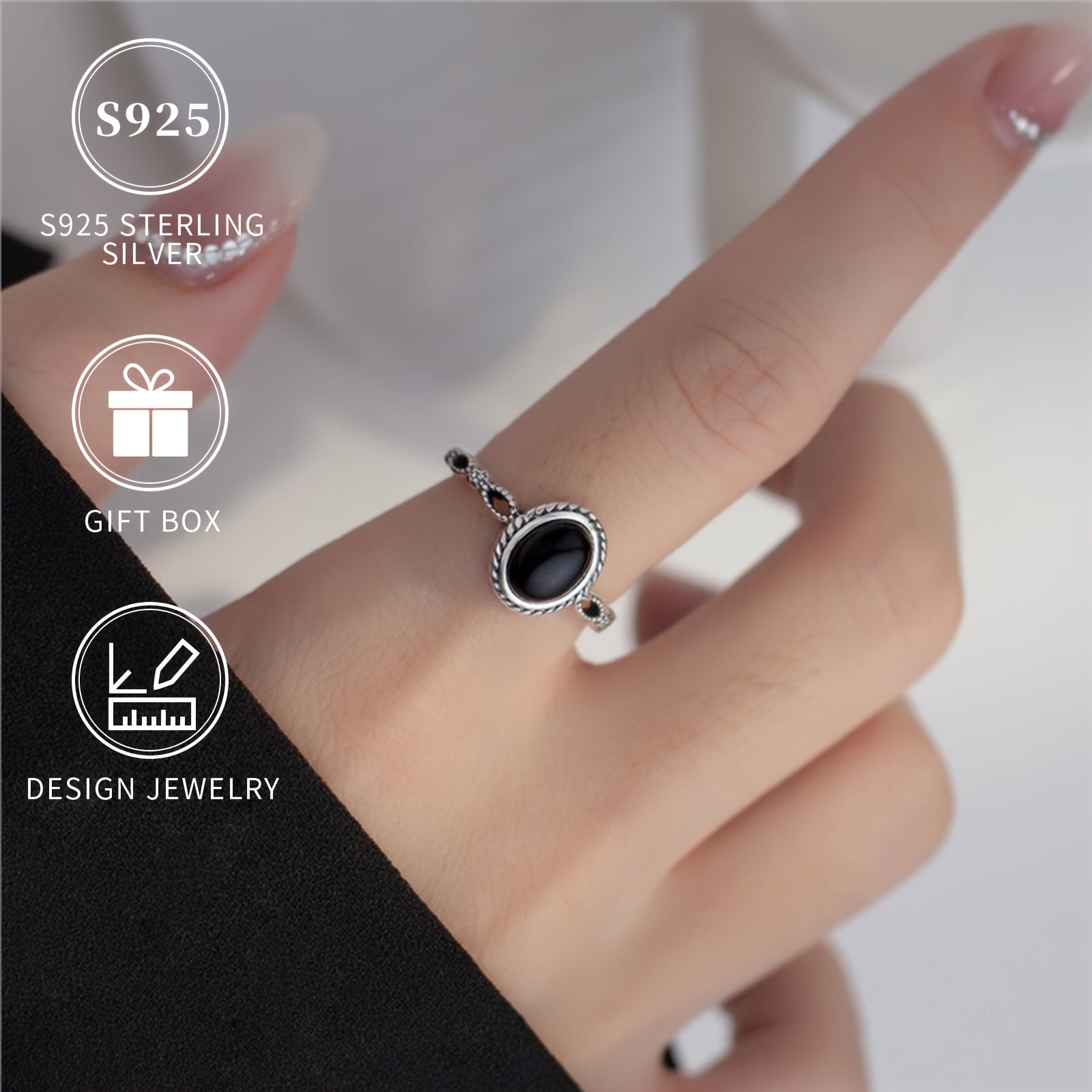 Ayollar uchun qora agate va oltin qoplamali detallarga ega Sterling Silver oval uzuk