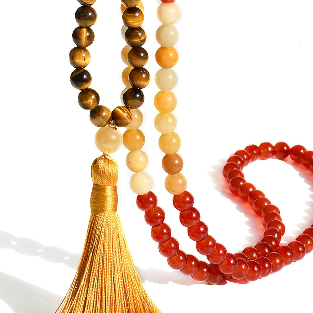 Vintage sviter zanjiri tabiiy tosh marjonlari va tassel pandenti bilan, tasodifiy kiyimlar uchun yoki Rojdestvo va Thanksgiving paytida sovg'a berish uchun mukammal. Ushbu Mala aksessuar Boho-Chic uslubini taratadi.