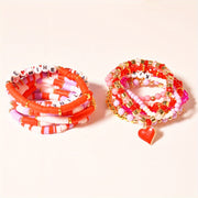 Polymer loydan tayyorlangan Sevgi kuni bilaguzuklar to'plami, 16 dona sexy uslubda, sevgi va do'stlikni ifodalash uchun mukammal. Ushbu marjonli zargarlik ayollar uchun har kuni yoki maxsus bayram tadbirlari uchun ideal. Bu ' uchun mukammal sovg'a