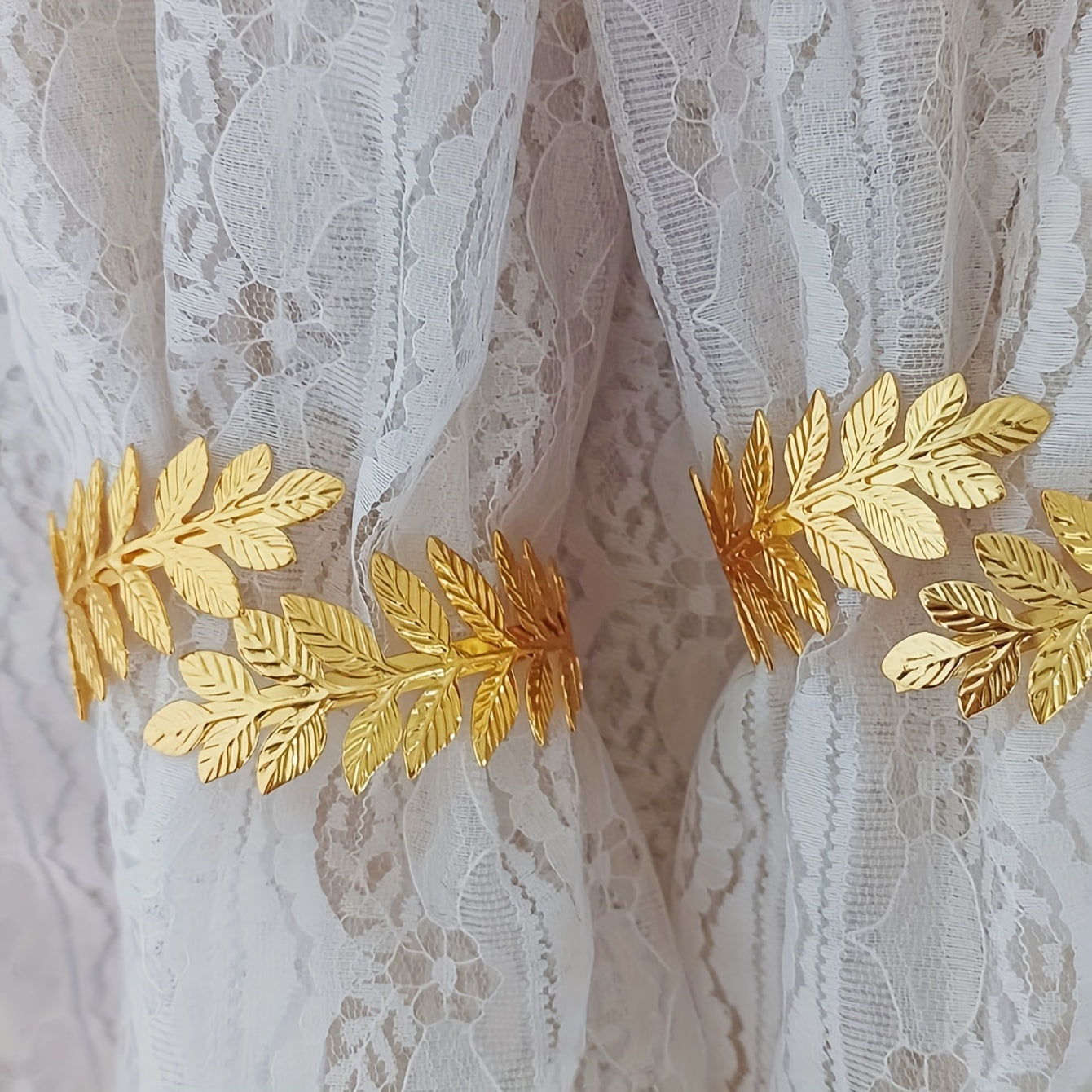 Decorative Curtain Tieback with Gold Accents and Leaf-Shaped Hooks