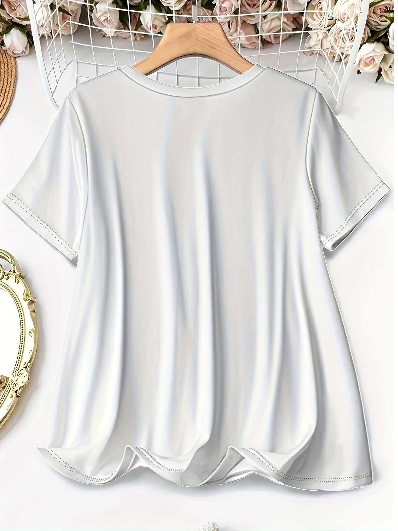 Plus Size White Graphic T-Shirt for Women with Pink Bow Comfortable Casual Top