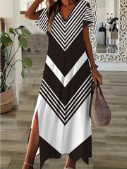 Geometrik naqshli, V-shaklida bo'ylama, yon yirtilishi bilan tasodifiy plussayz libos. Elastik polyester aralashmasidan tayyorlangan, mashinada yuvish mumkin.