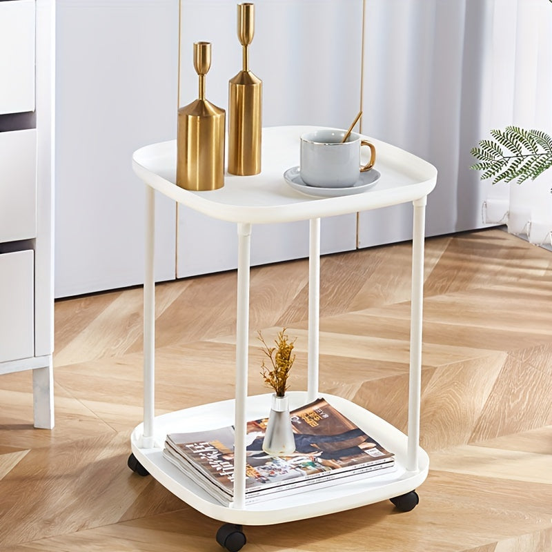 Mesa auxiliar compacta con ruedas y almacenamiento para uso en café y junto a la cama