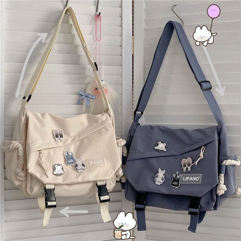 Bolso de nylon de gran capacidad estilo Harajuku para hombres y mujeres con diseño retro de ropa de trabajo y insignias