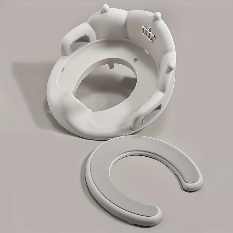 Asiento de entrenamiento para niños con diseño de corona, base resistente blanca y acolchado cómodo