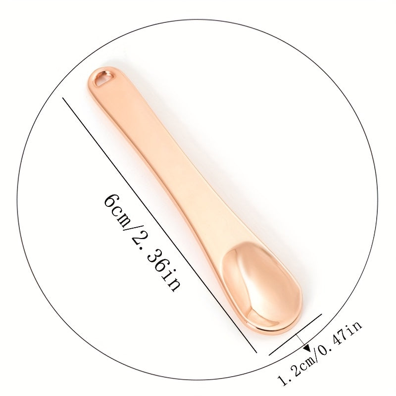 Sink qotishmasi ko'z kremi qoshiq va yuz niqobi qo'llash uchun massaj tayoqchasi - batareya talab qilinmaydi, ideal 14-fevral sovg'asi, silliq tugatish, sink qotishmasi materiali, yuz massajeri.