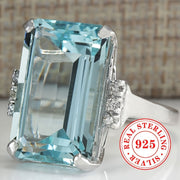 Sterling Silver Ring with Synthetic Aquamarine March Birthstone 4-Prong Setting