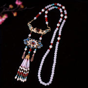 Yangi, nafis marvarid bilaguzuk, tassel va pendant bilan, an'anaviy Xitoy uslubida ishlab chiqilgan. Bayram tadbirlari va har kuni kiyish uchun mukammal.