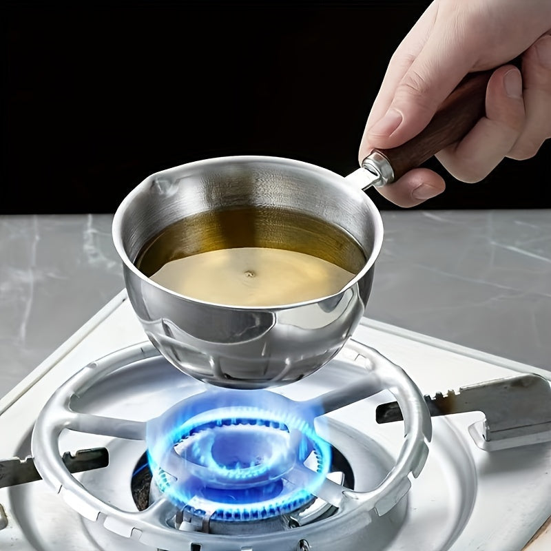 Cazo de acero inoxidable con mango de madera para cocinar y calentar