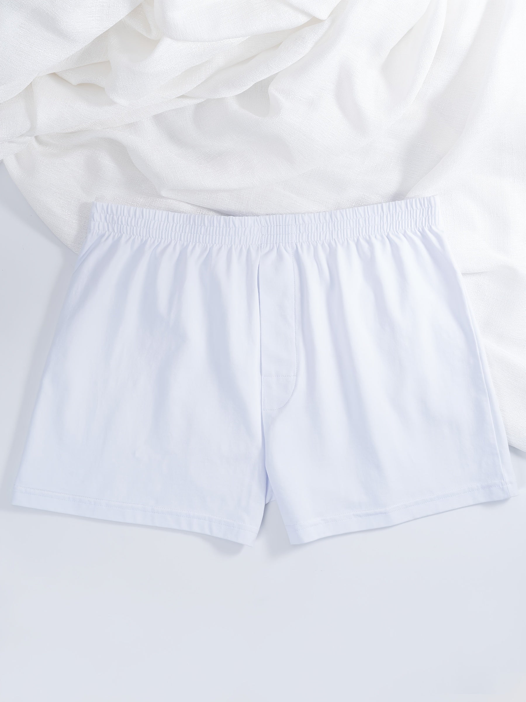 5 ta klassik paxta qattiq ichki kiyimlar erkaklar uchun oq rangda, nafas oladigan va qulay, tasodifiy kiyim va sport uchun mukammal. 95% paxtadan tayyorlangan, elastik bel bog'ichi bilan.