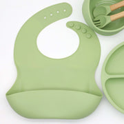 7-Piece Silicone Baby Utensils Set with Bowl Plate and Wooden Handle Spoons Forks Green
