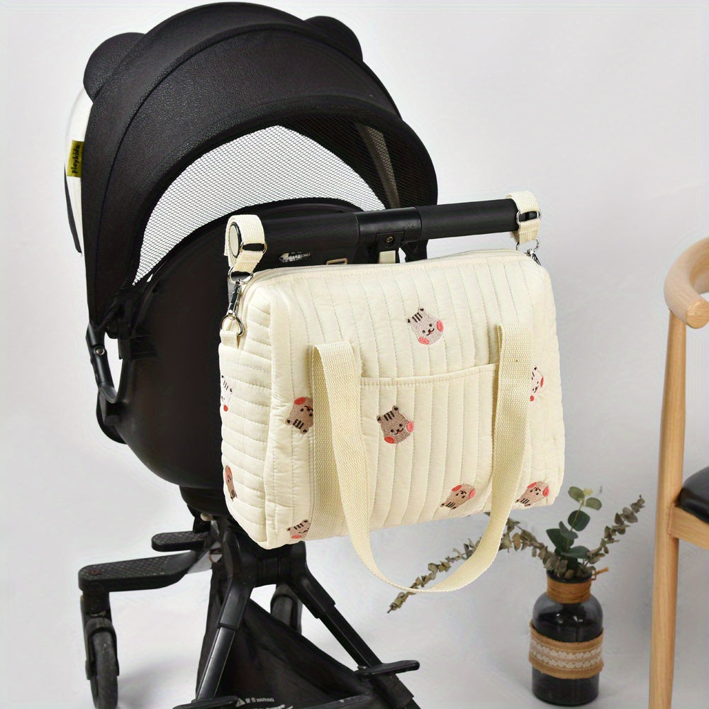 Spacious Embroidered Diaper Bag with Milk Bottle Organizer Multi-Functional Baby Stroller Hanging Bag