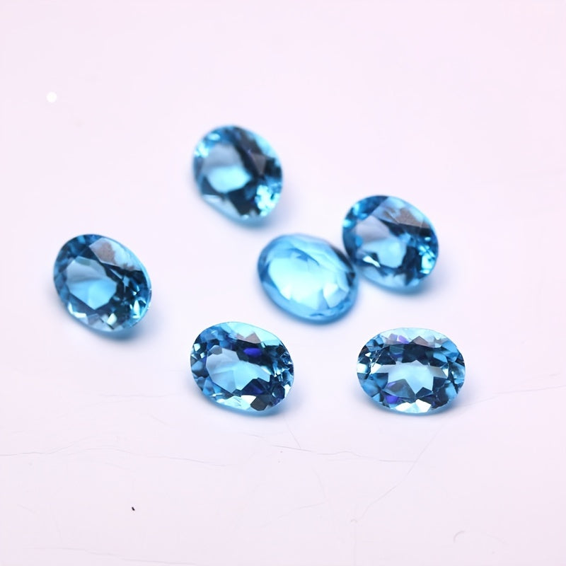 Кольцо в форме яйца с голубым топазом и розовым топазом с кристально чистыми драгоценными камнями