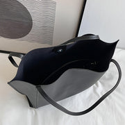 Zamonaviy, yengil yelka sumkasi, katta sig'imga ega, kundalik foydalanish yoki sovg'a sifatida mos keladi.