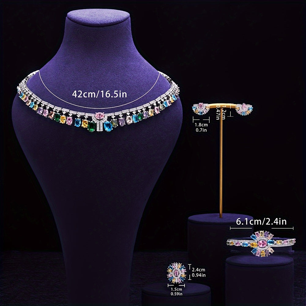 Zarif kelin zargarlik to'plami, kubik zirkoni bilan - to'ylar va maxsus tadbirlar uchun marjon, bilaguzuk, uzuk va sirg'alar o'z ichiga oladi.