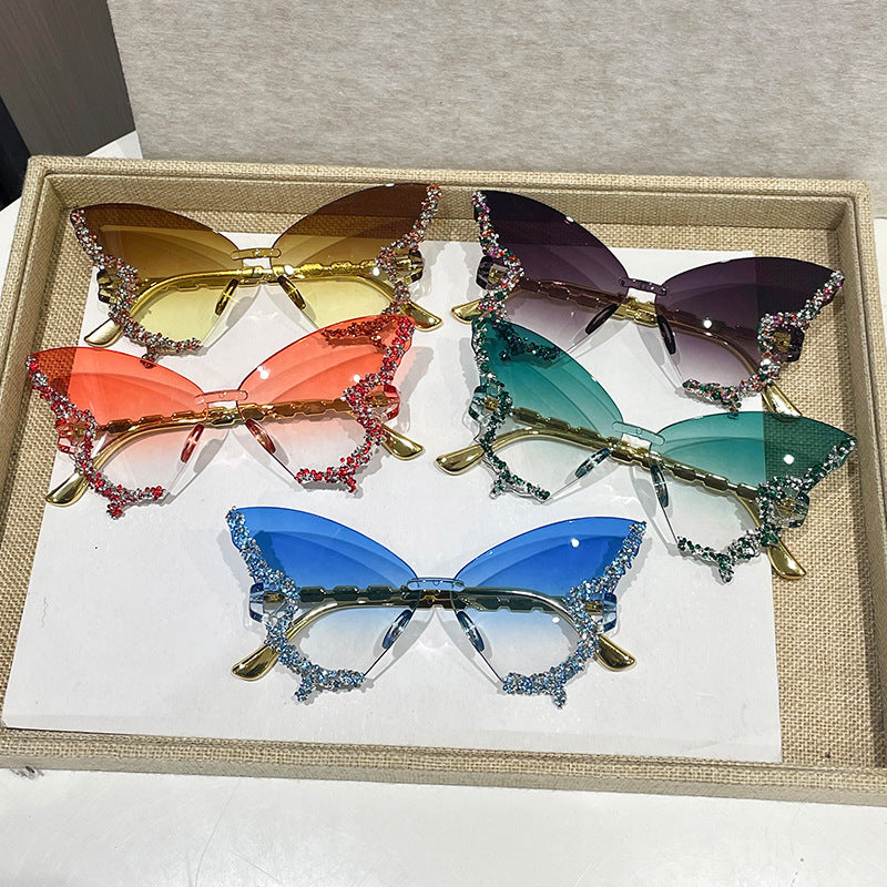Women's Butterfly-Shaped Rimless Glasses with Rhinestone Accents and Polycarbonate Lenses