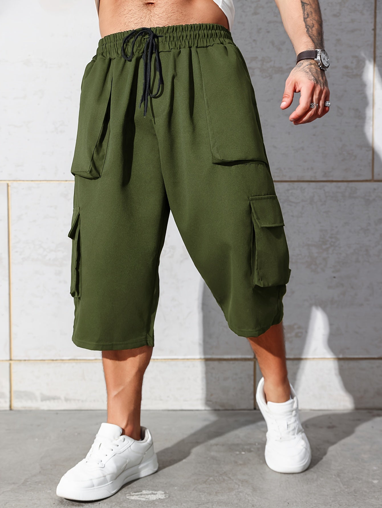 Pantalones cargo de talla grande para hombre de corte relajado hasta la rodilla con múltiples bolsillos y cintura con cordón
