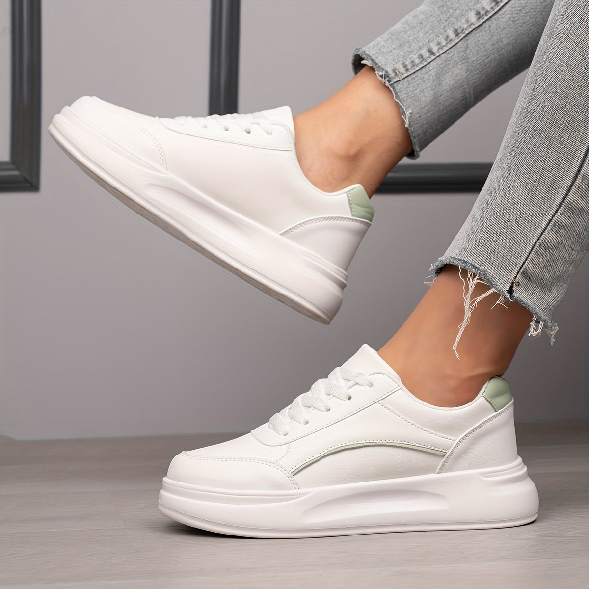 Women's White Low Top Skate Shoes with Round Toe and Lace-Up Closure