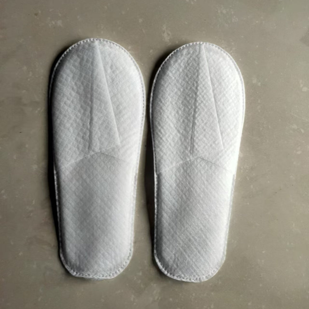 Paquete de 10 zapatillas desechables de fibra no tejida para huéspedes de hoteles y spas