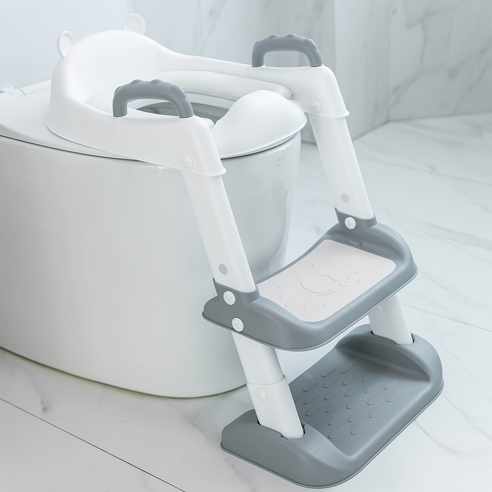 Poyabzal o'rnida o'rnatiladigan hojatxona o'rindig'i, qulay va xavfsiz dizayn, sirpanishga qarshi yostiqlar, suv to'sig'i.