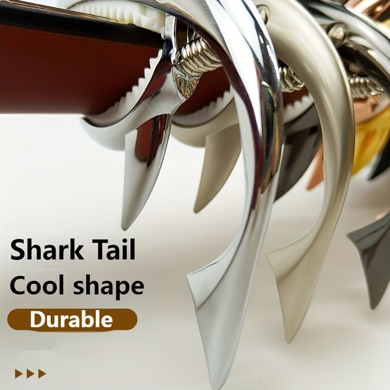 Akustik va elektr gitarlari uchun zamonaviy sink qotishma capo, tonni o'zgartiradi.