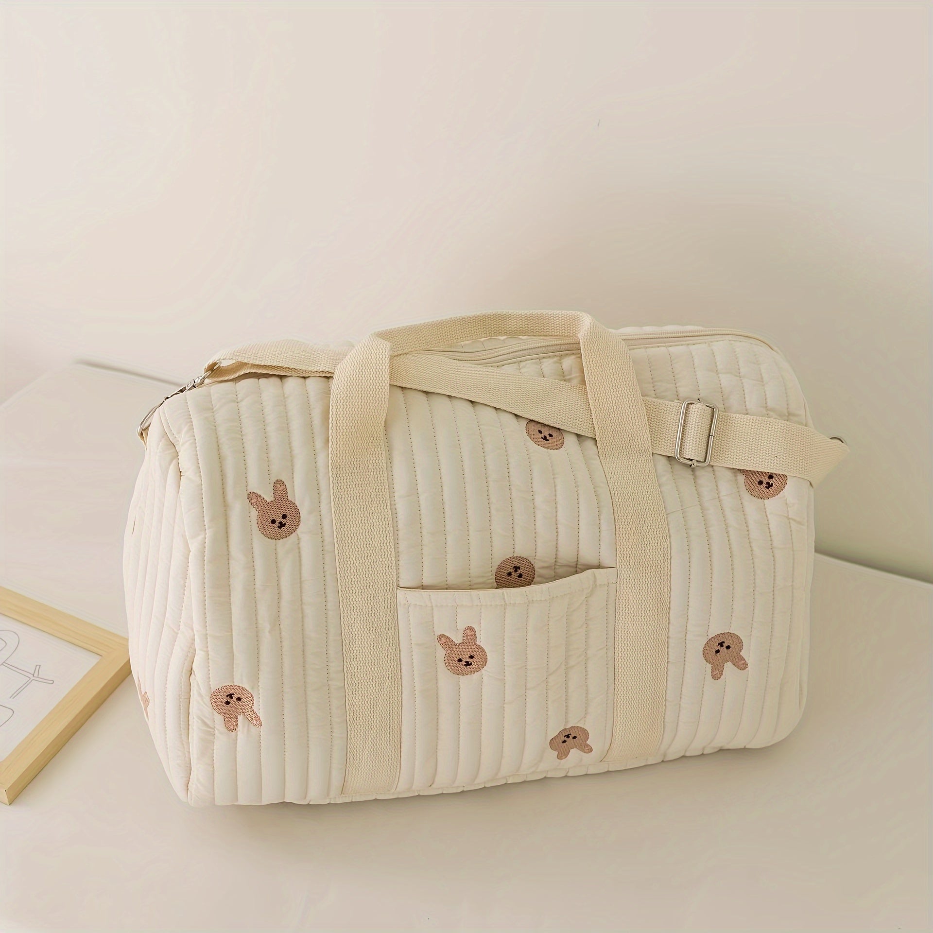 Quilted Diaper Bag for Parents with Embroidered Animal Print and Multiple Compartments